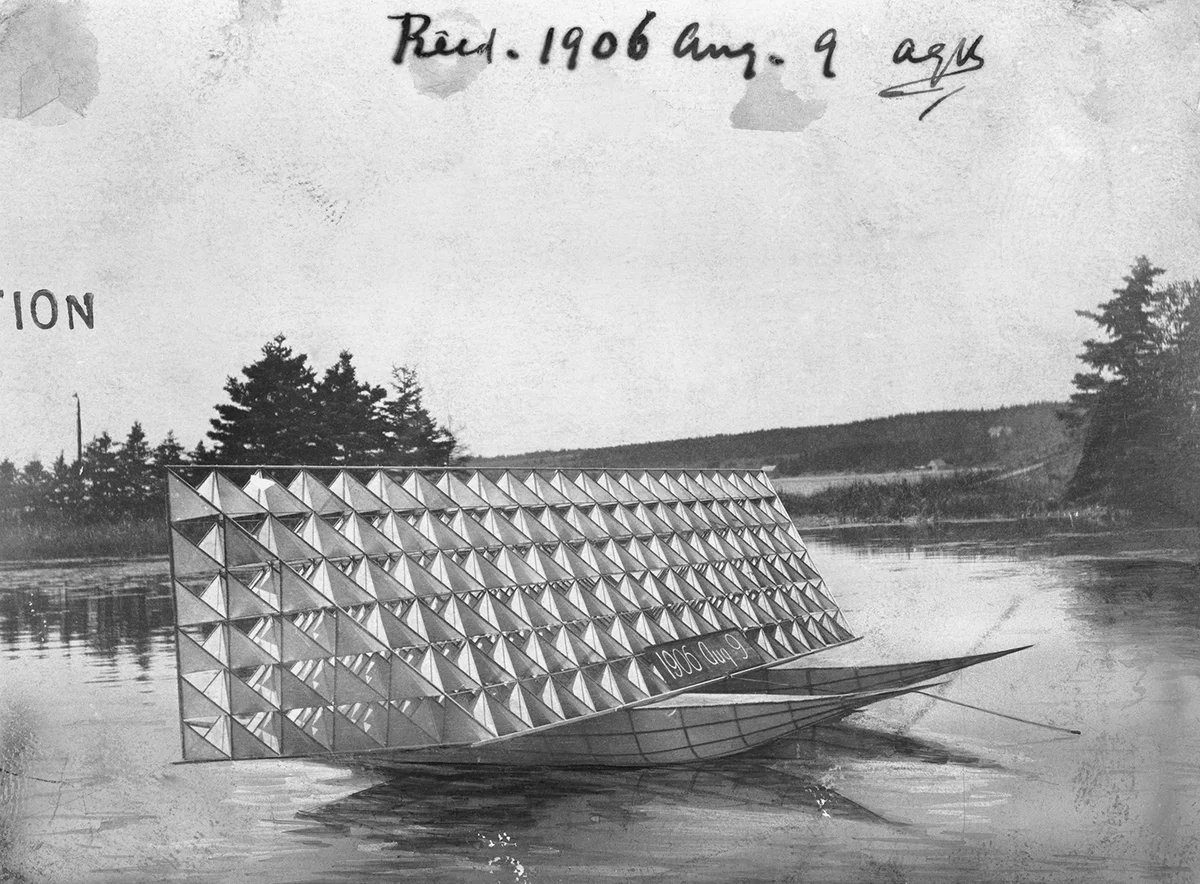 A large panel of tetrahedral cells mounted on a boat hull floating on the lake at Beinn Bhreagh, 9 August 1906