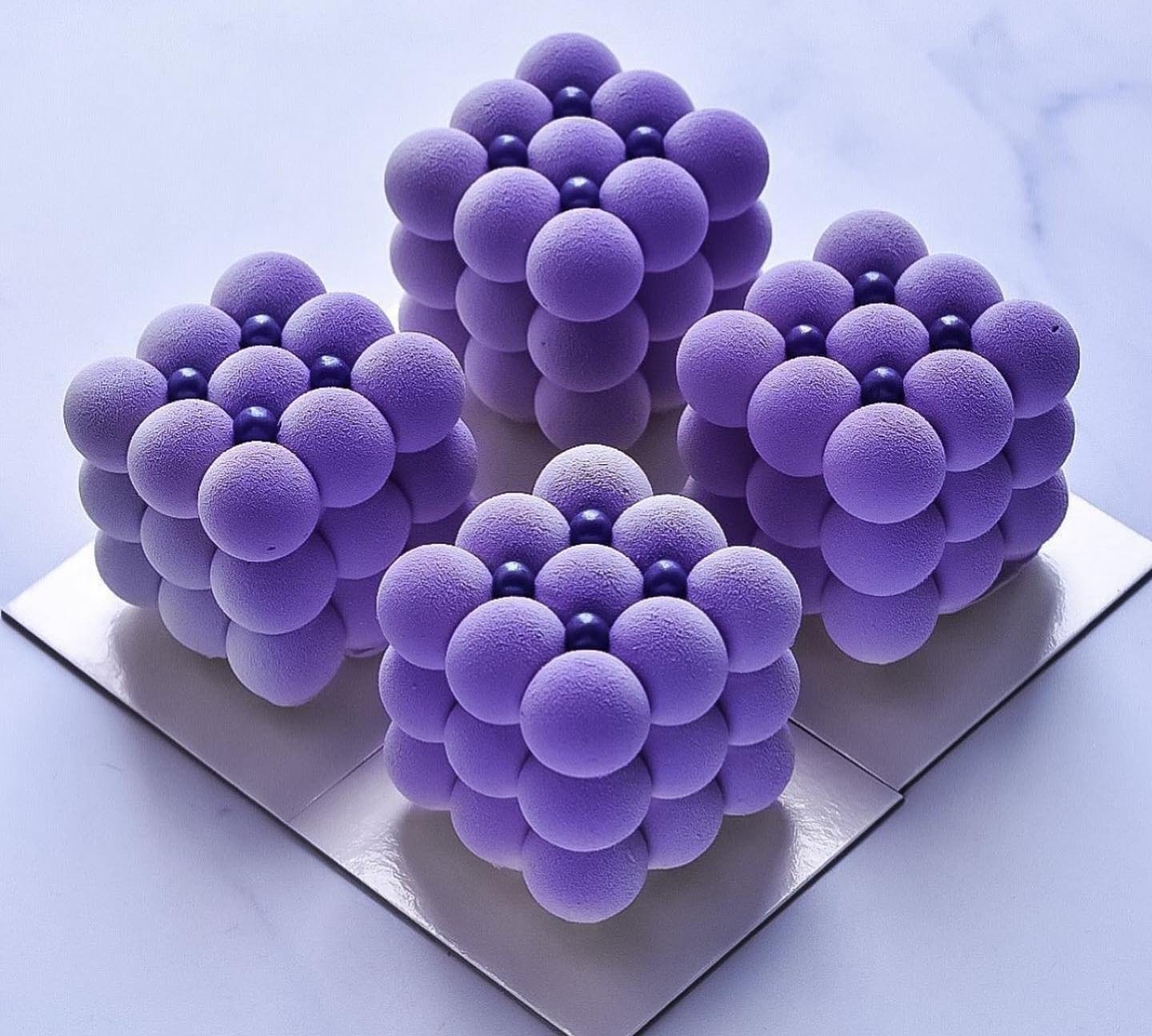 Side view of a kinetic tart showing how chocolate blade angles create different visual patterns