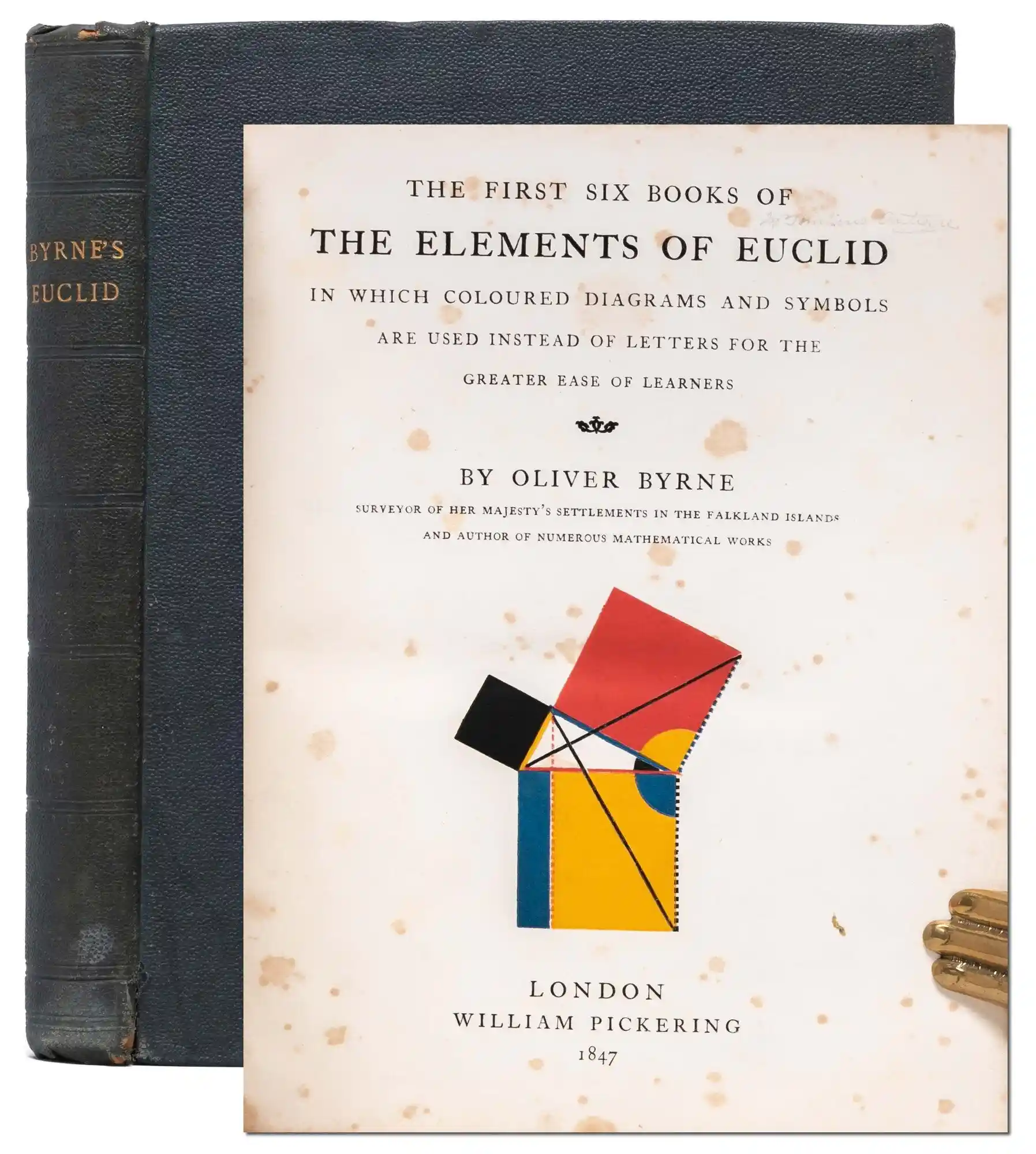 The title page of Byrne's Euclid, London 1847, with the Pythagorean theorem drawn in red, yellow, blue and black, in front of the book's dark cloth binding